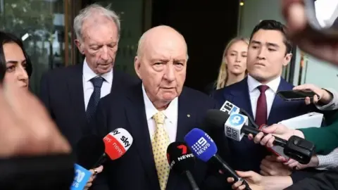Sex Abuse Charges Against Top Australian Radio Host Lessened
