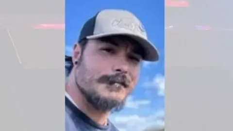 Police locate body they think US man accused of murdering his three girls